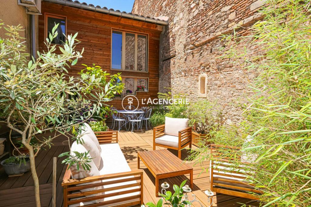Appartement d’exception avec terrasse – 286 m² de caractère en plein cœur de Réalmont